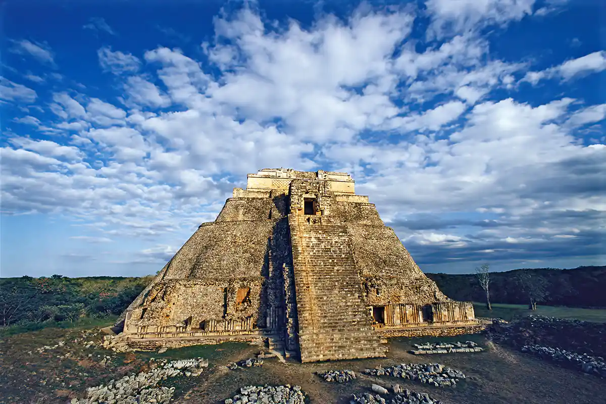 Pyramid of the Magician at Uxmal, Mayan architecture with detailed facades.