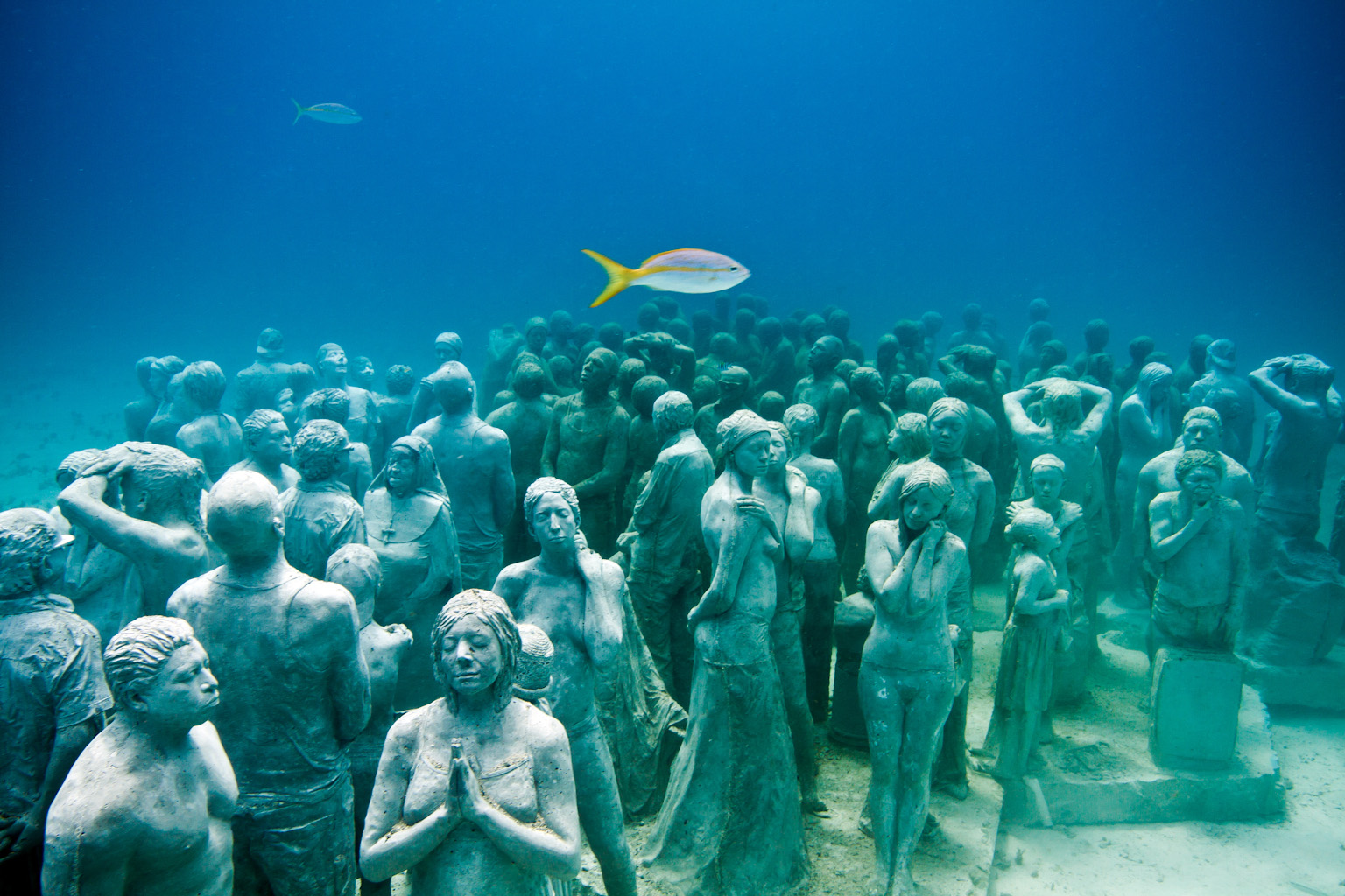 Divers at MUSA Underwater Museum of Art in Cancún.